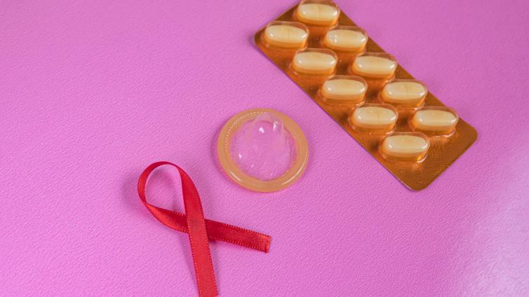 Ribbon, condom, pills